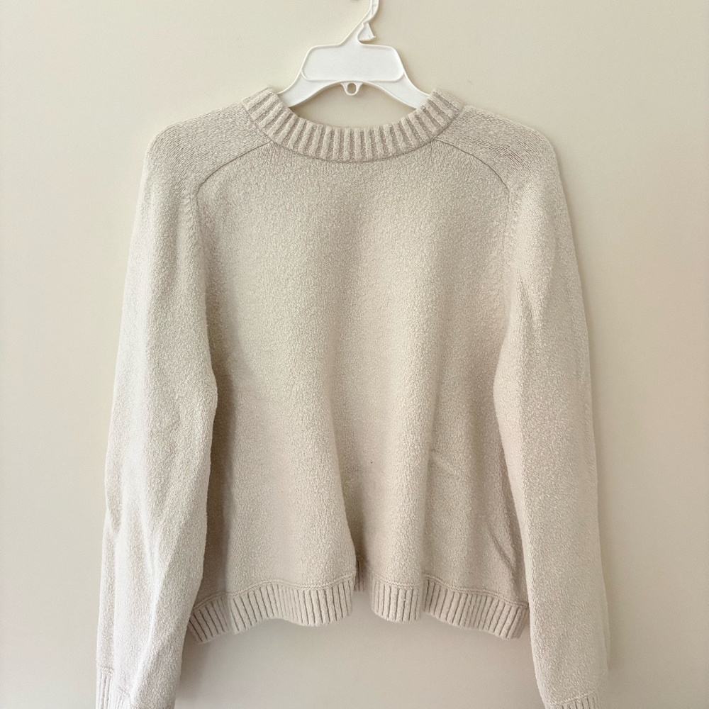 Lululemon Cream Crew Neck Sweater with Modern Cropped Design